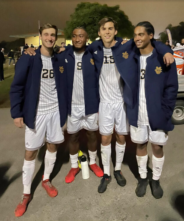 Bond-Flasza (right) with teammates Axel Adler, Lawrence Yamaguchi and Michael Orozco.