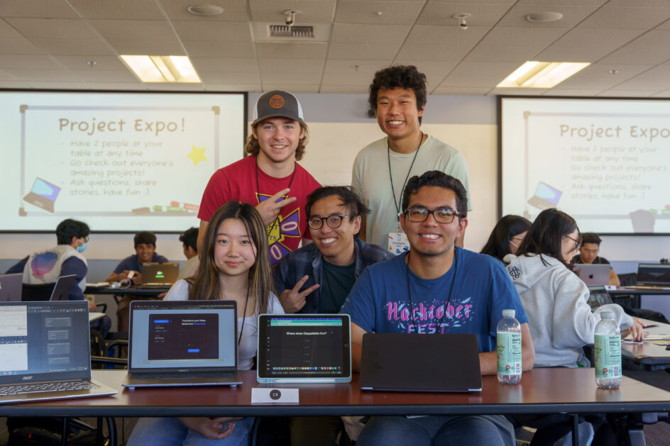 ZotCards members behind devices displaying their project.