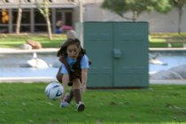 Crystal plays soccer with Sara and Quinn
