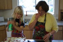 Sara and Phyllis make dinner