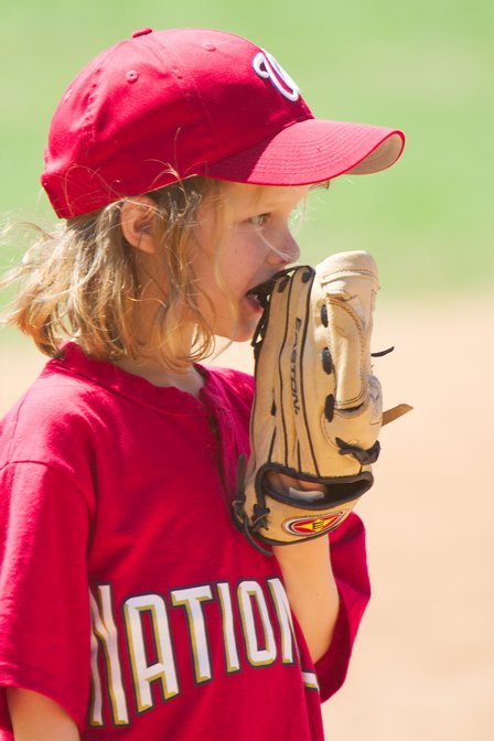 Dara Bites Her Mitt