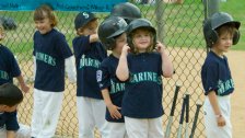 The lineup lines up behind the backstop