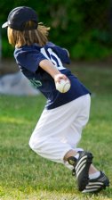 Alana running to first with the ball