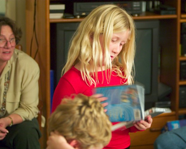 Sara with two DVDs
